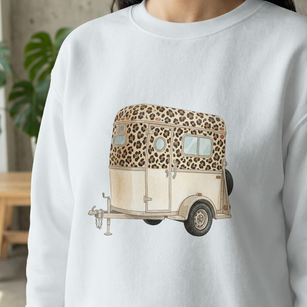 White sweatshirt with leopard print trailer graphic.