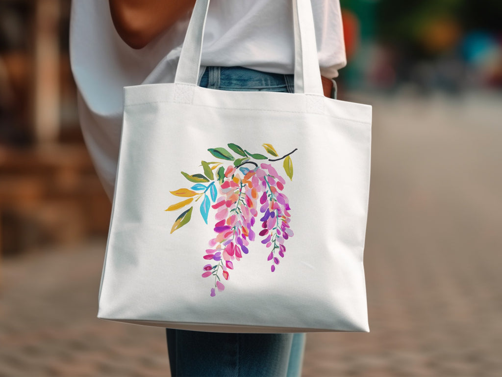 White tote bag with watercolor wisteria floral illustration.