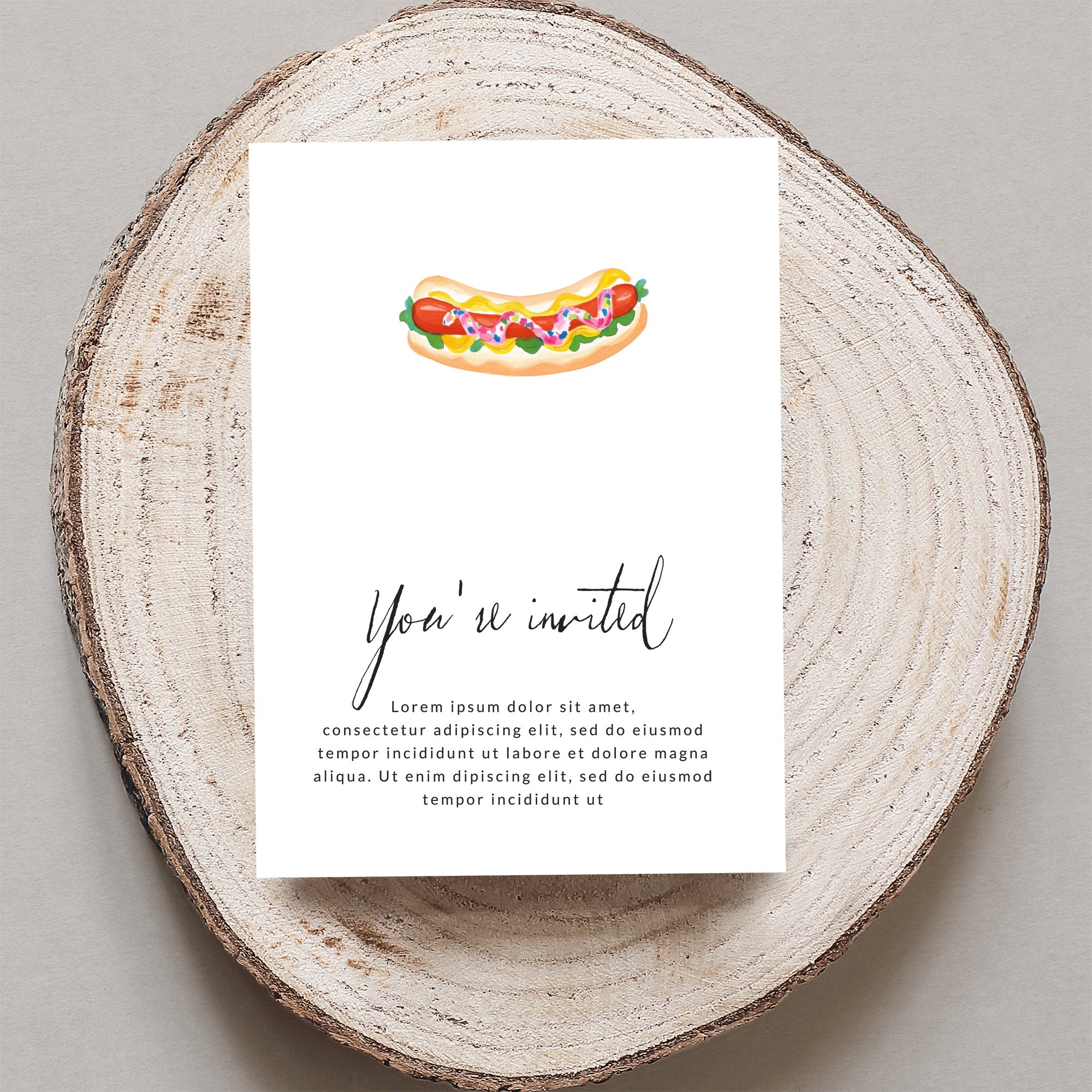 Invitation with a hot dog graphic and "You're invited" text.
