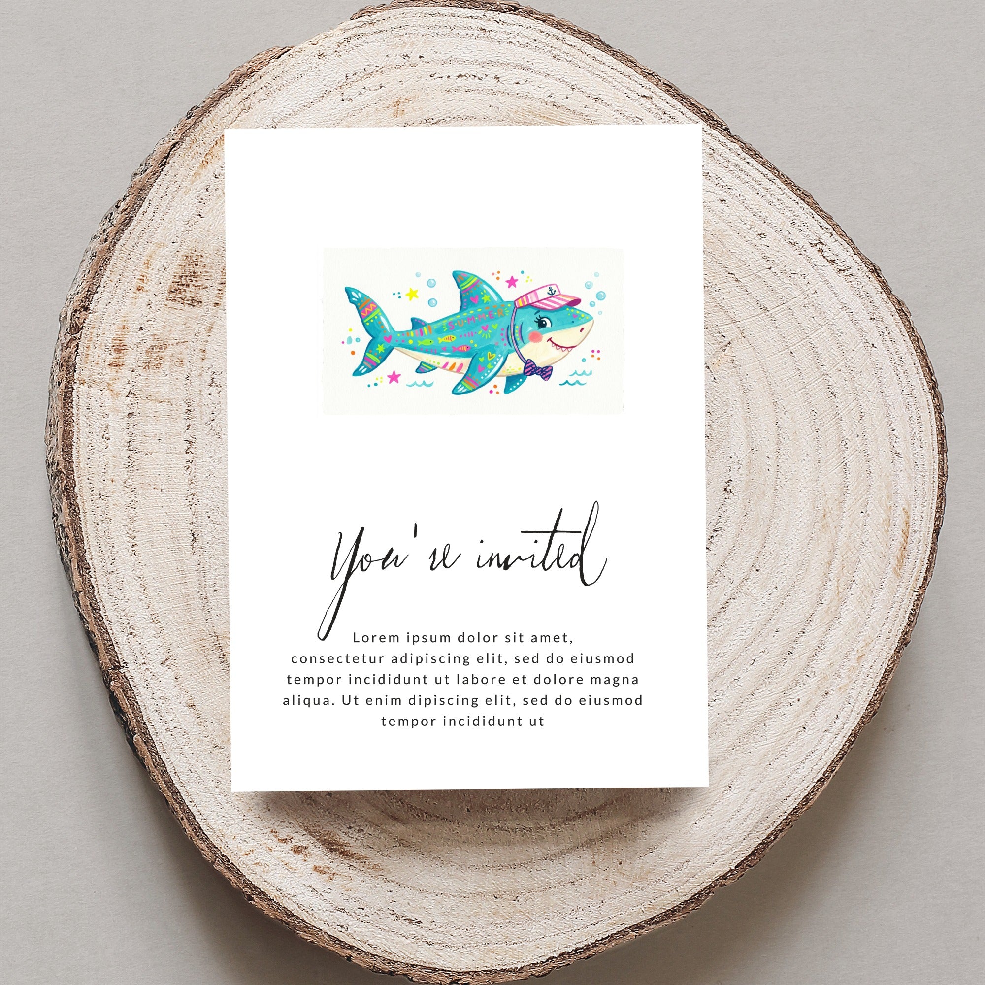 Shark invitation with "You're invited" text and placeholder copy.