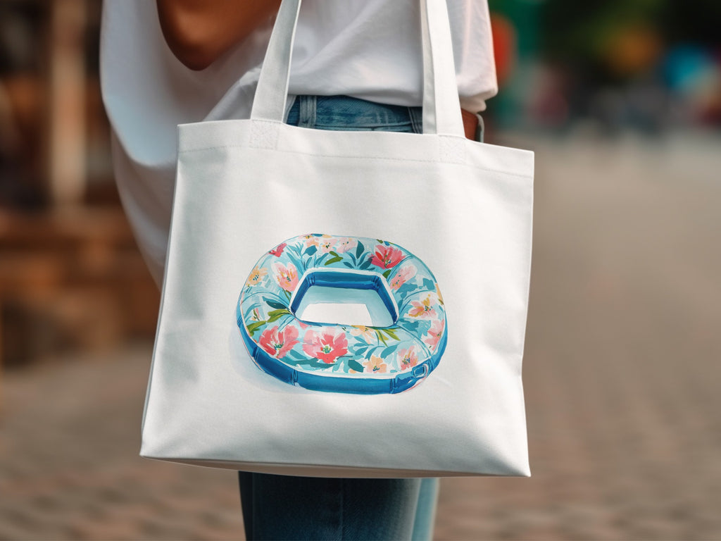 White tote bag with floral print inner tube graphic.