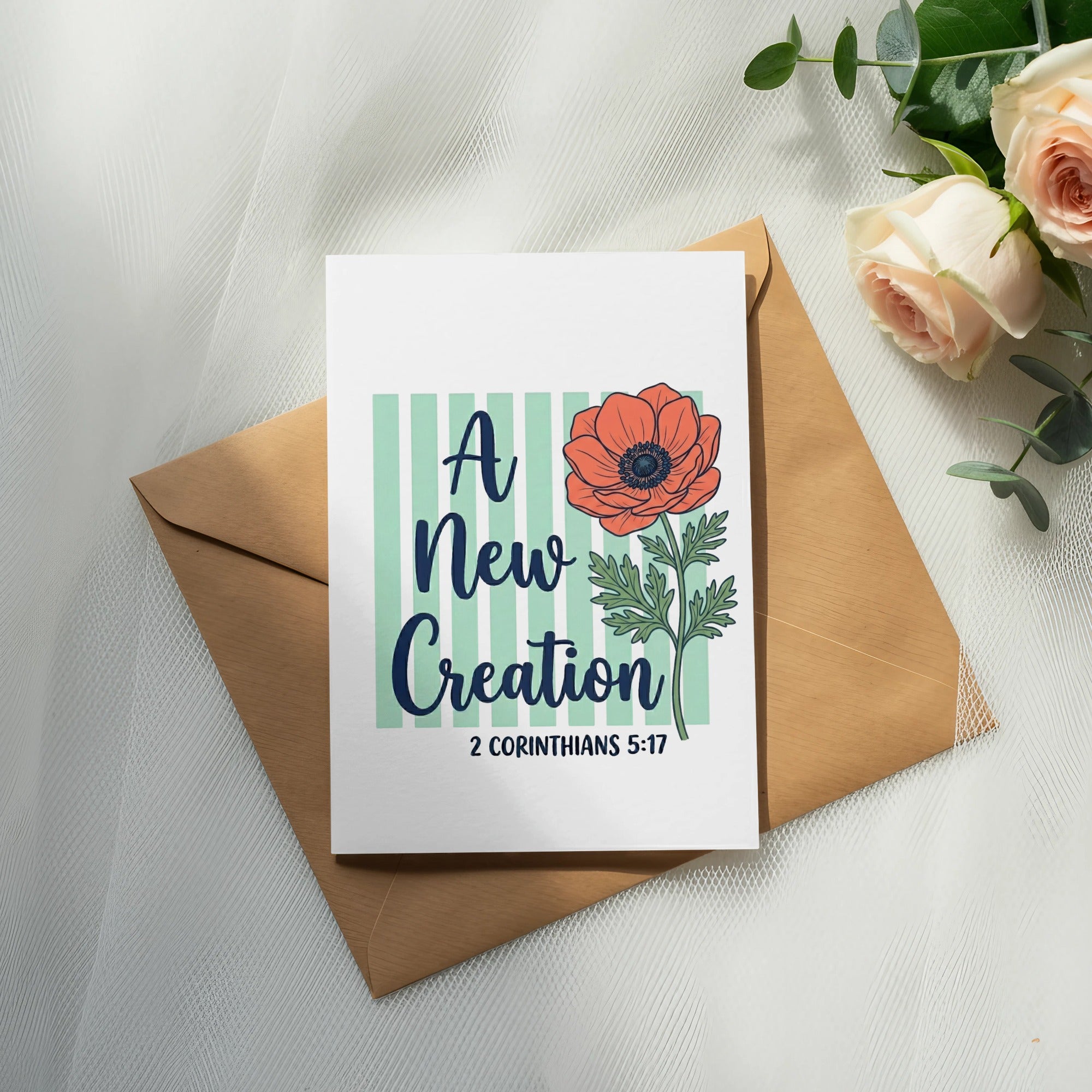 Card with "A New Creation" text and poppy, on envelope with roses.