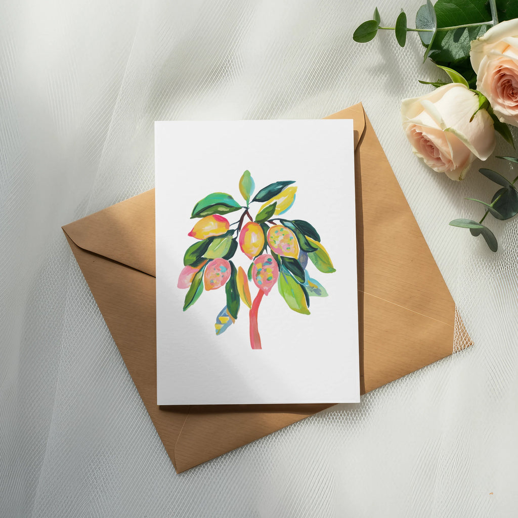 Watercolor illustration of a lemon tree on a card, with a kraft envelope.