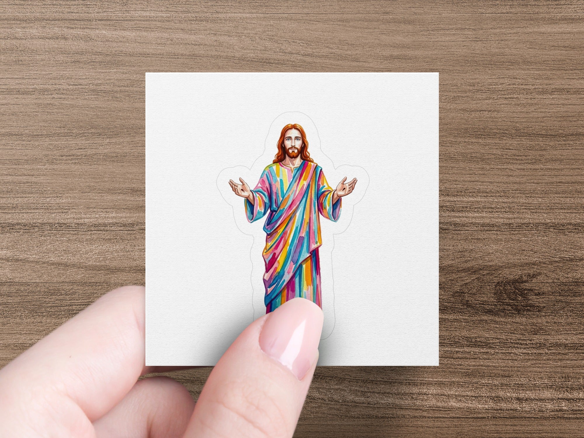 Jesus with outstretched arms wearing a colorful robe.