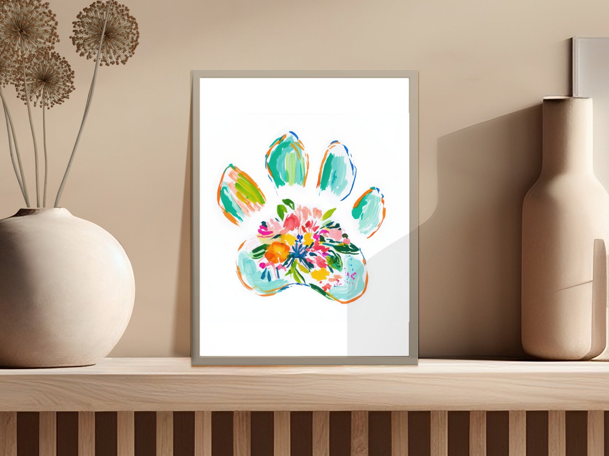 Colorful paw print filled with abstract flowers and leaves.