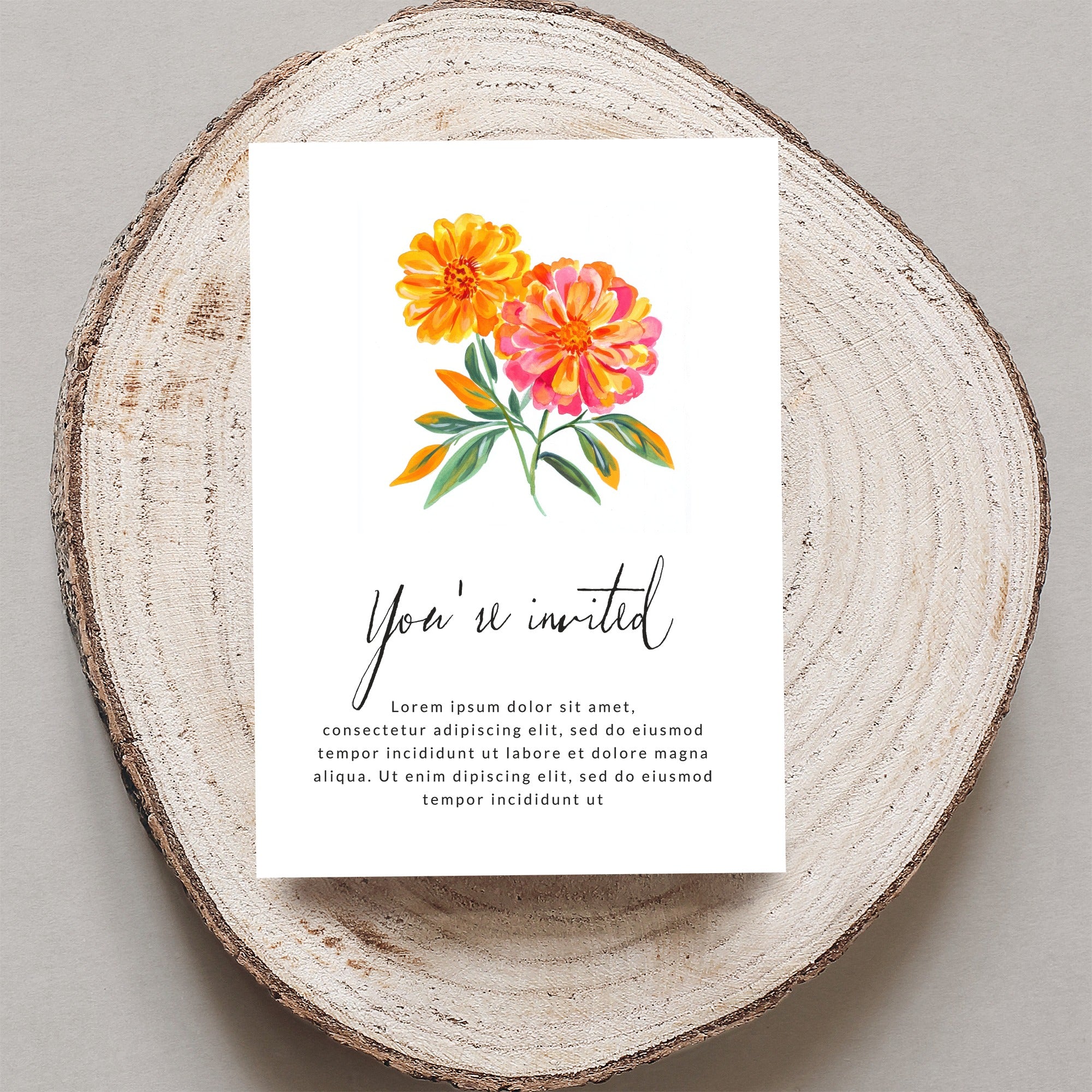 Invitation with watercolor marigolds and "You're invited" text.