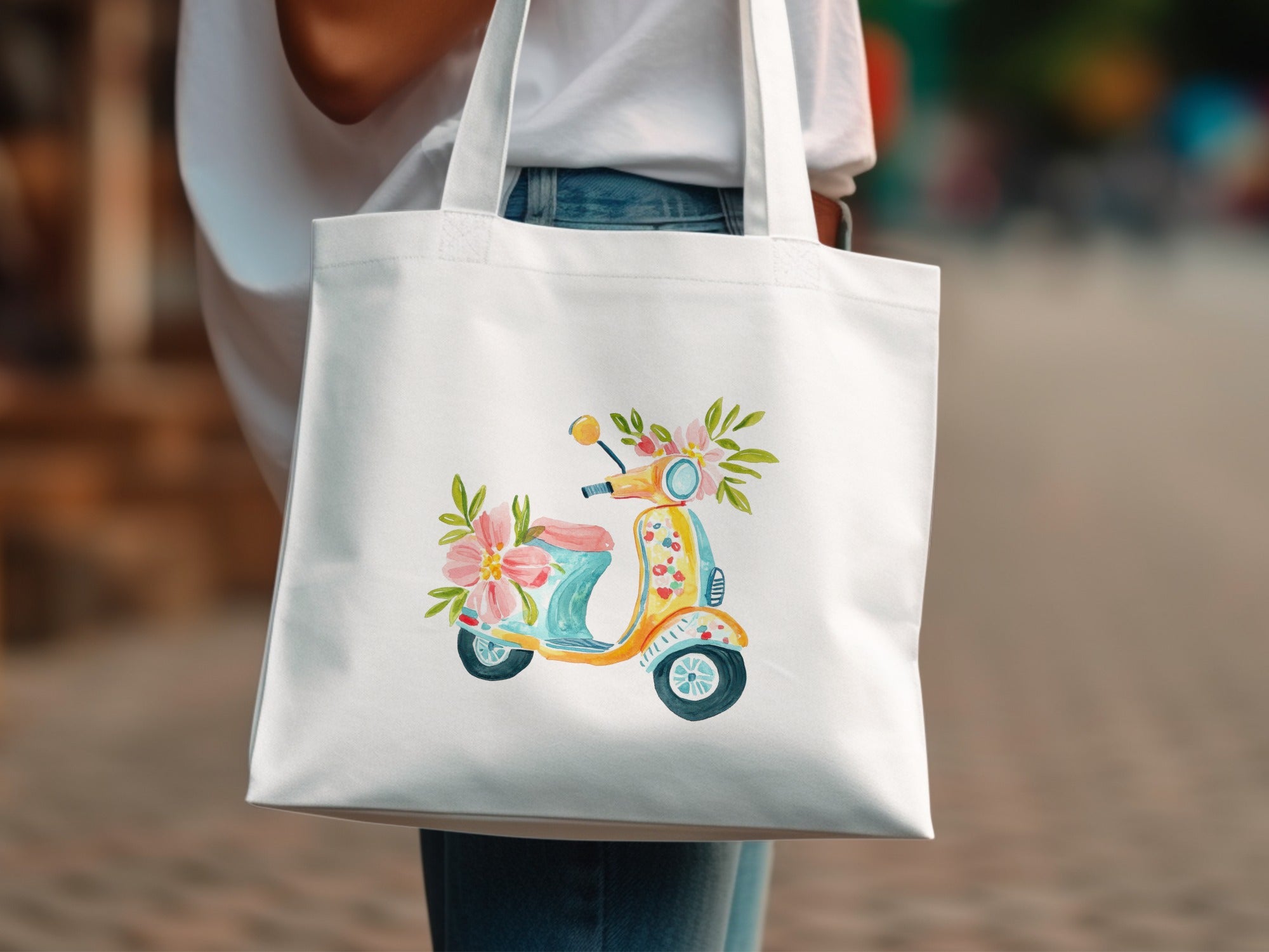 White canvas tote bag with colorful scooter and floral illustration.
