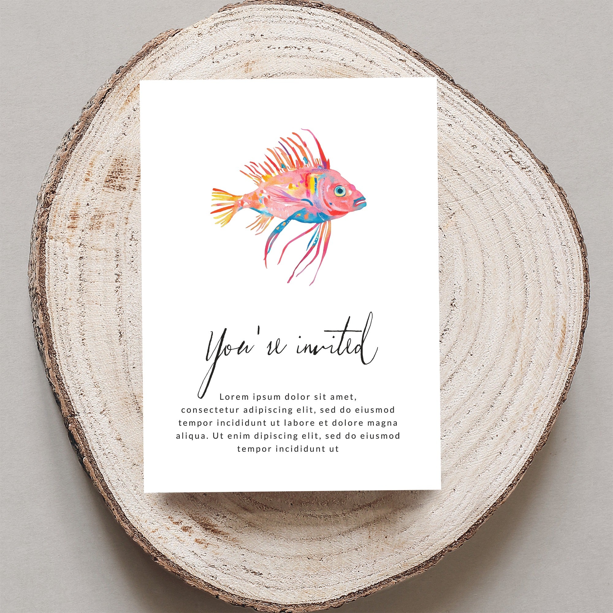 Invitation card with watercolor fish and placeholder text.