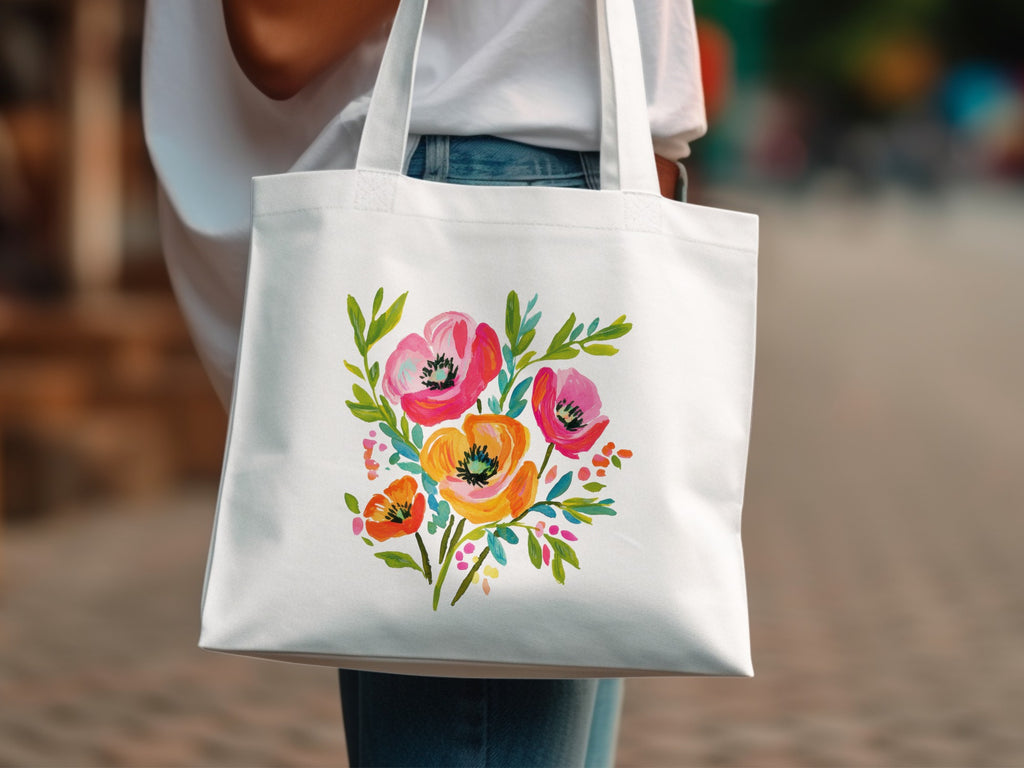 White tote bag with a colorful floral bouquet design.