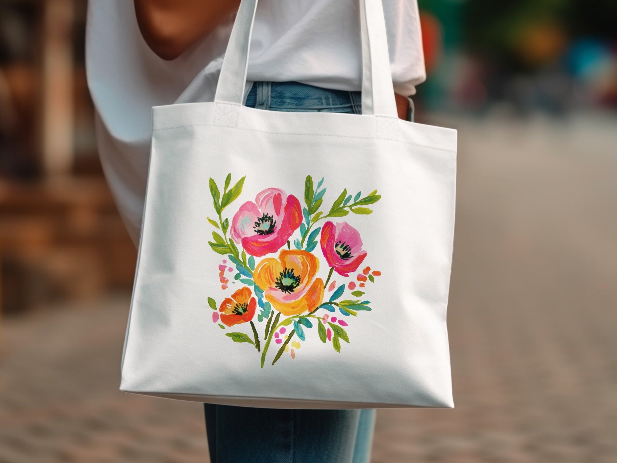 White tote bag with a colorful floral bouquet design.