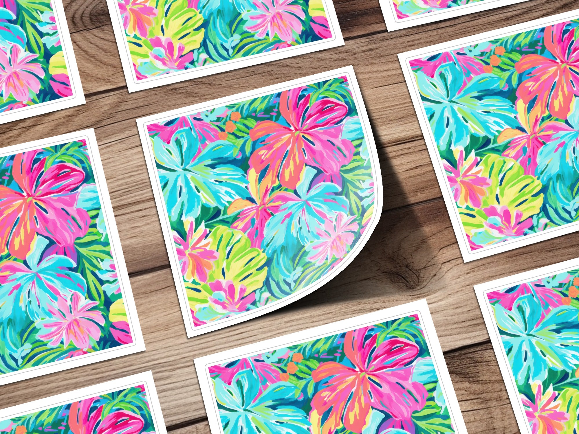 Colorful floral pattern on several square cards.