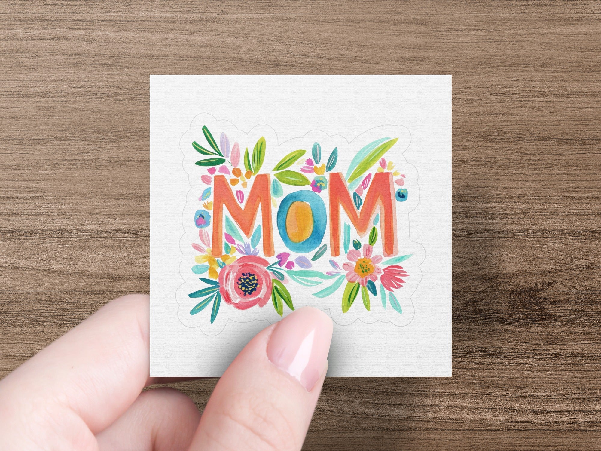 Floral "Mom" text design with colorful flowers and leaves.