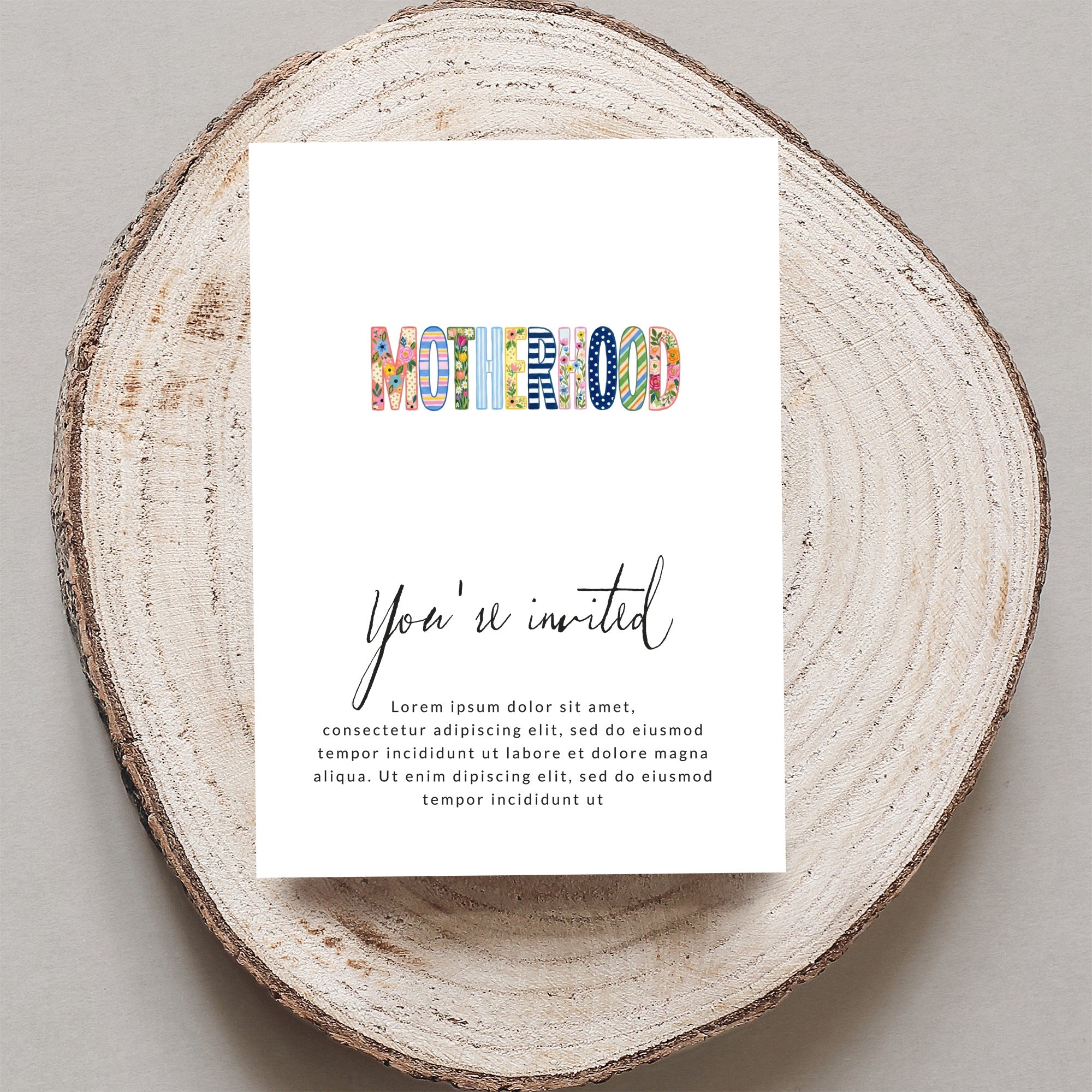 "Motherhood" invitation with decorative text and placeholder content.