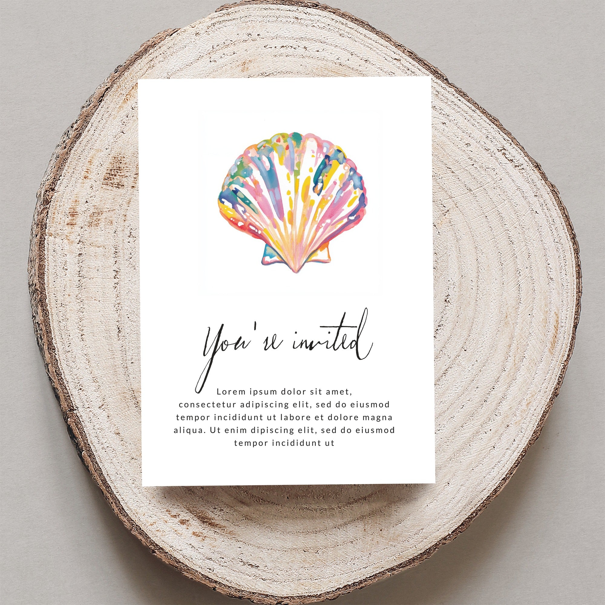 Invitation with a colorful seashell and placeholder text.