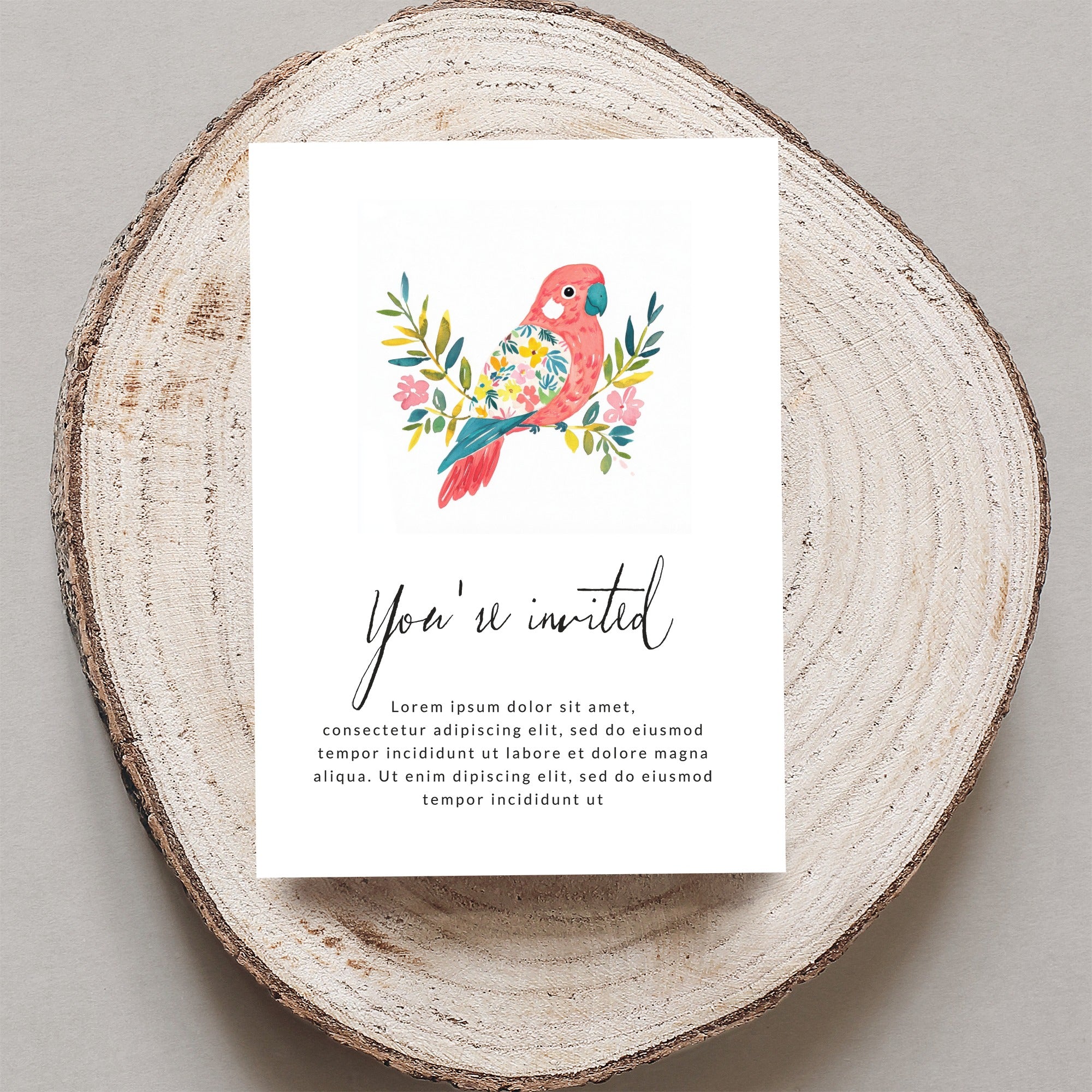 Invitation card with floral parrot illustration and "You're invited" text.