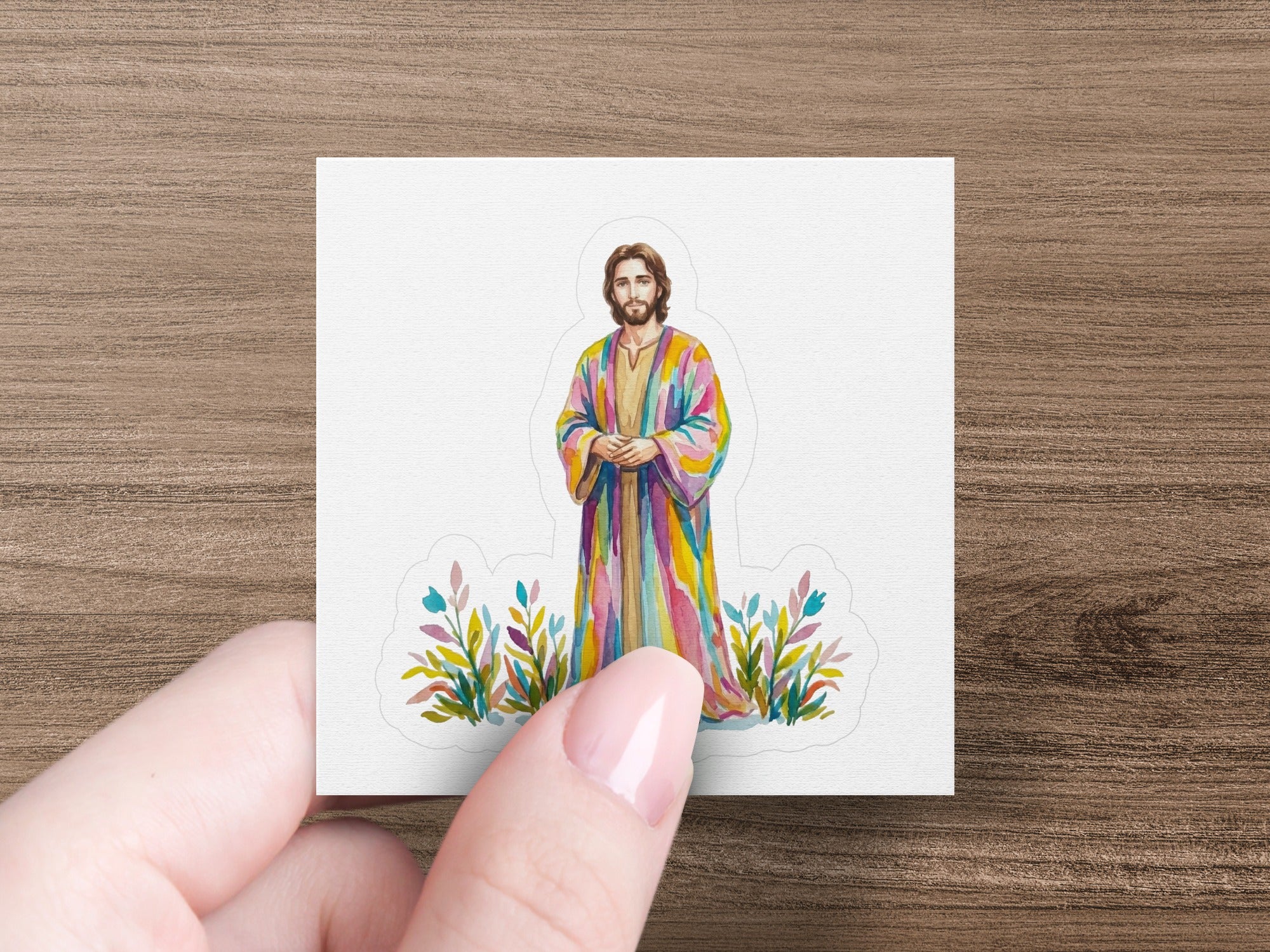 Jesus figure in a rainbow robe with floral accents.