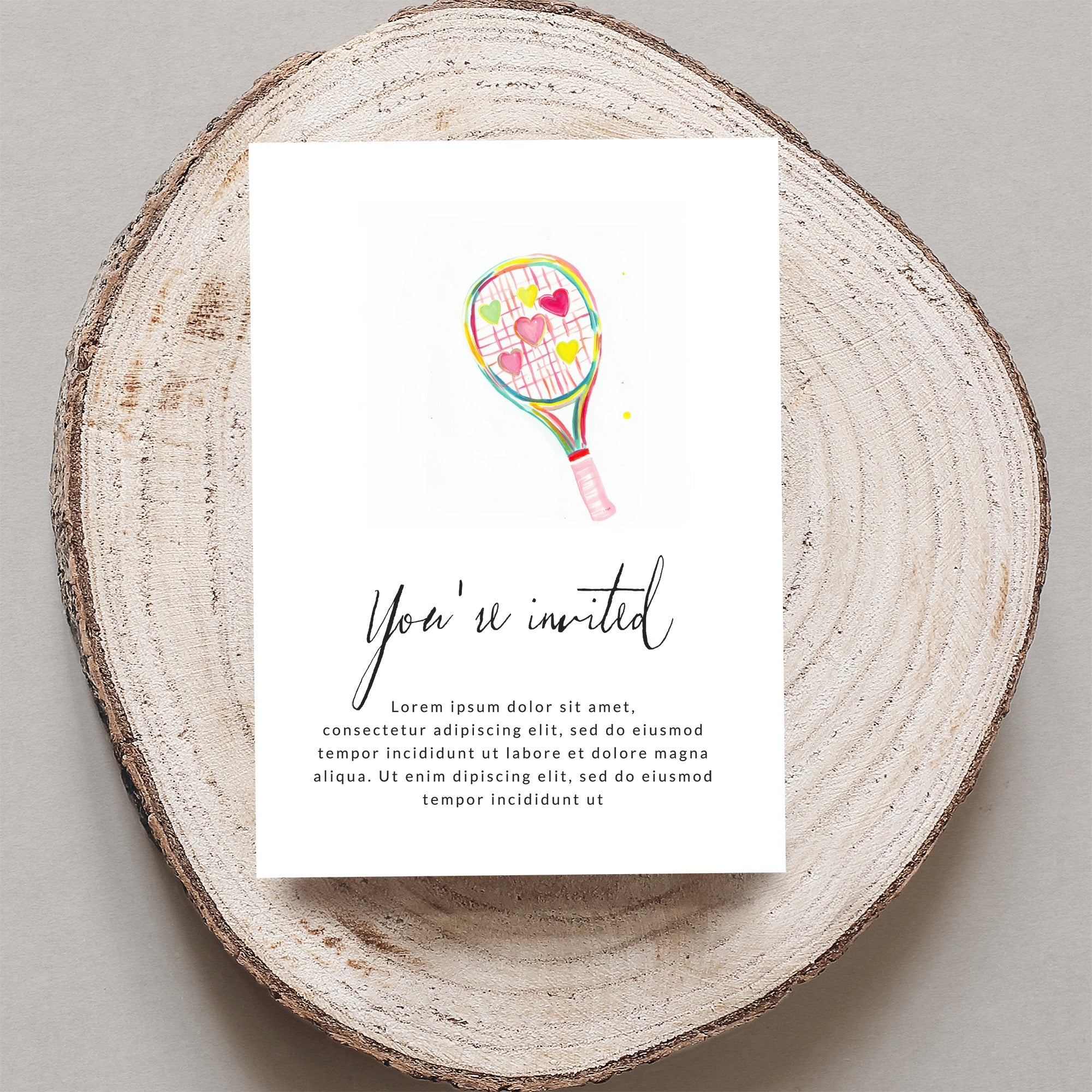 Invitation card with "You're invited" and placeholder text, featuring a tennis racket with heart-shaped strings.