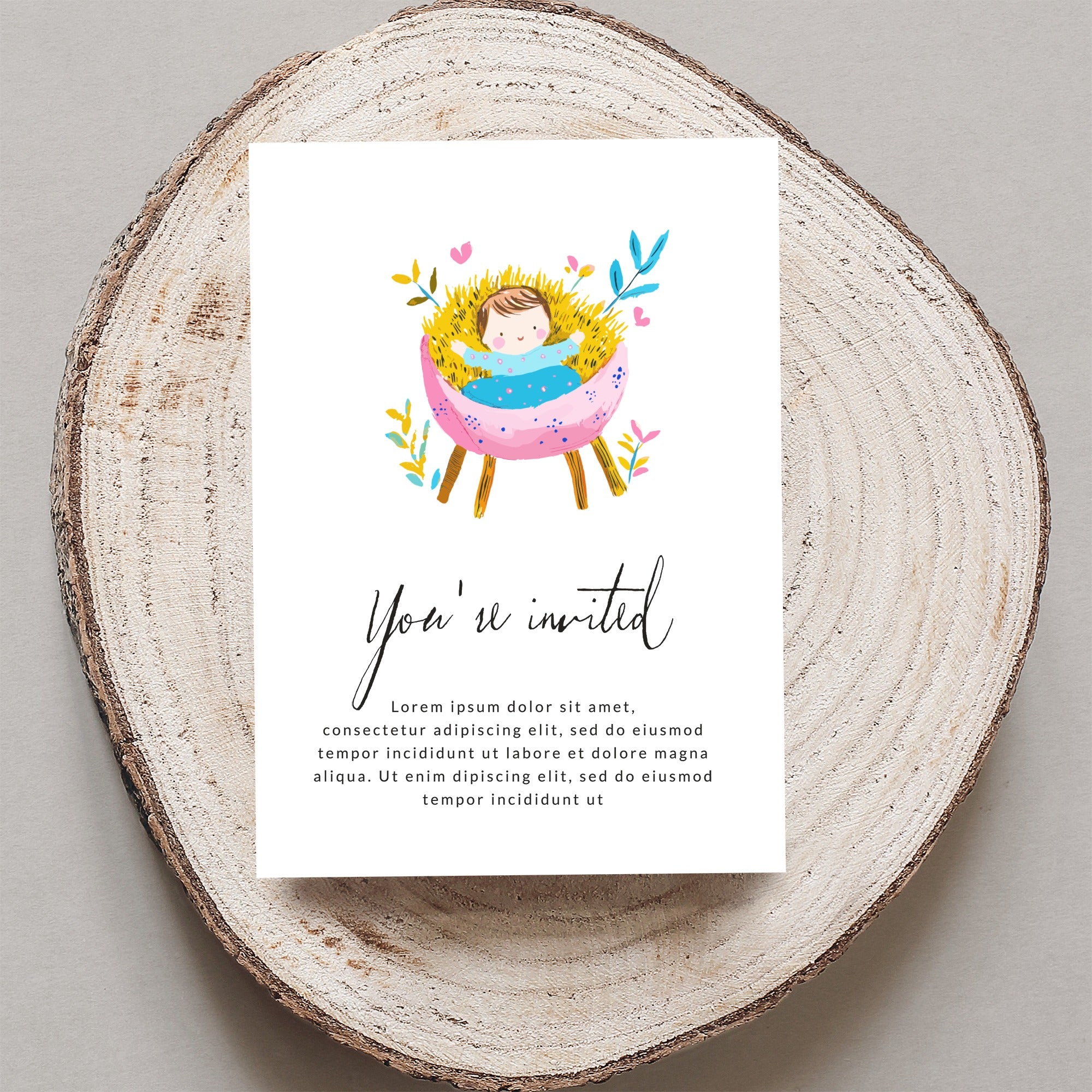 Invitation with baby in manger illustration and "You're invited" text.