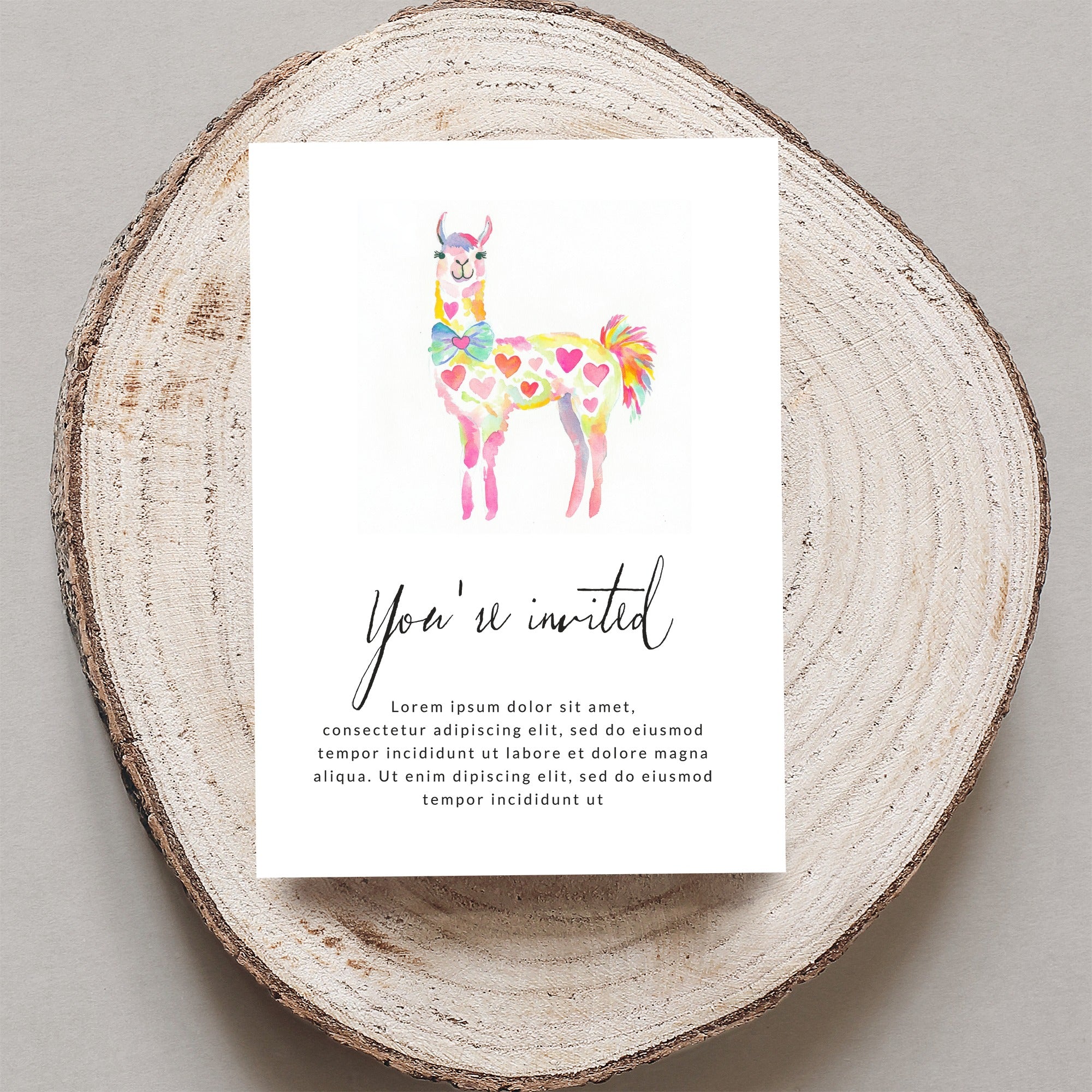 Colorful llama invitation with "You're invited" text and placeholder copy.