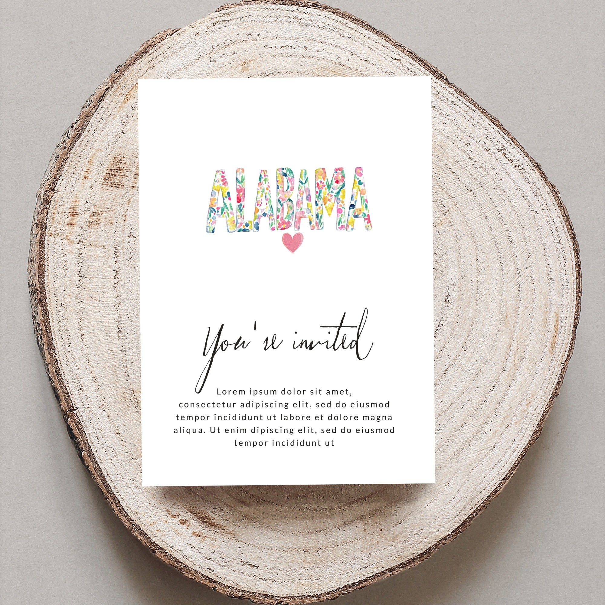 Invitation with "ALABAMA" in floral letters and "You're invited" text.