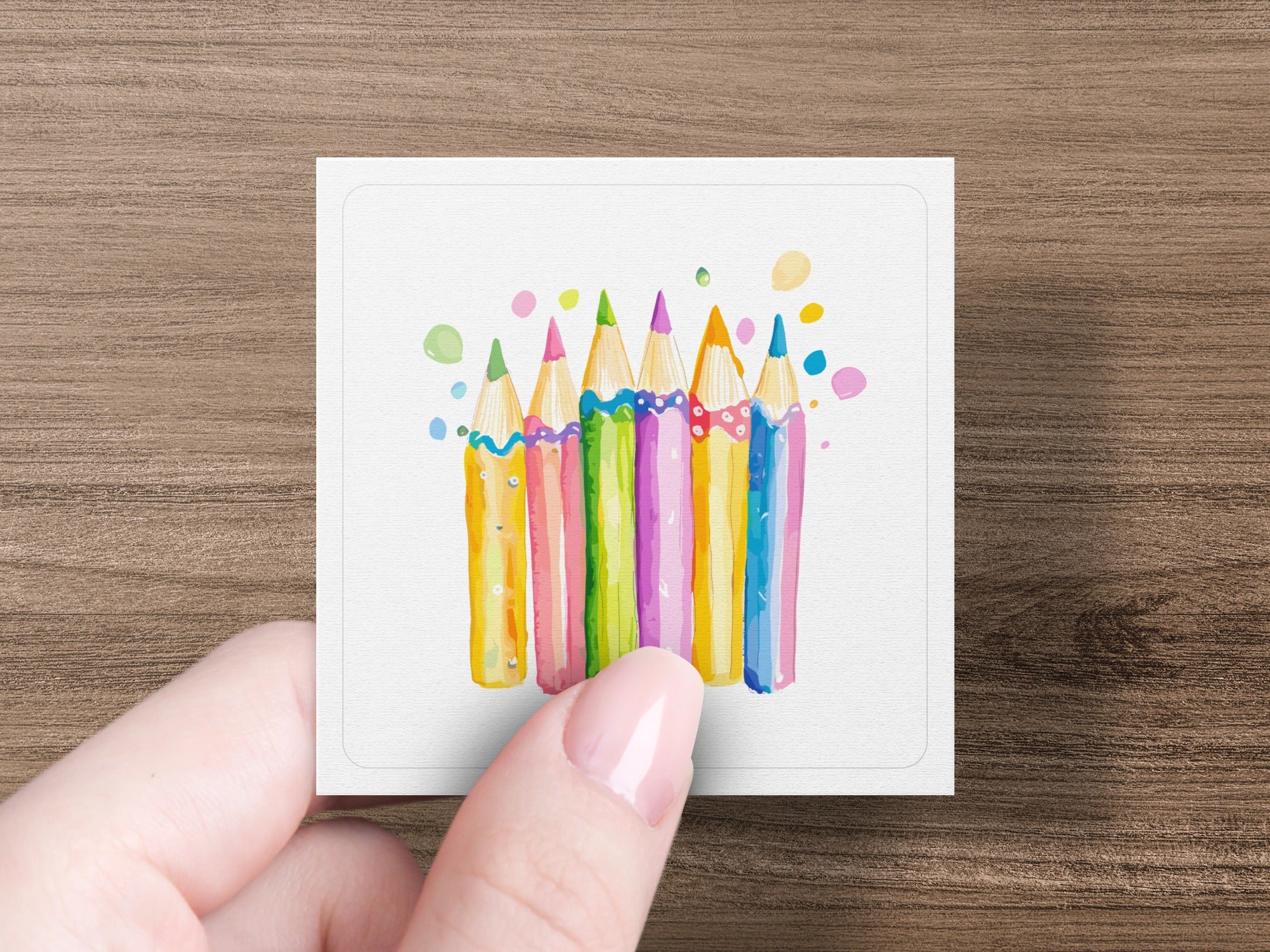 Watercolor drawing of seven colorful pencils with vibrant tips.