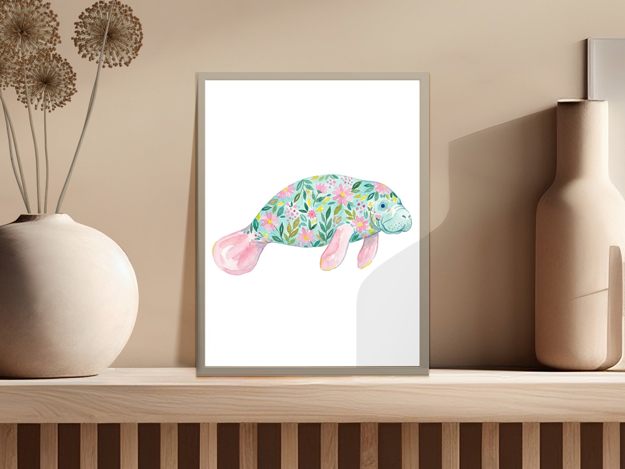 Watercolor manatee art print with floral pattern.