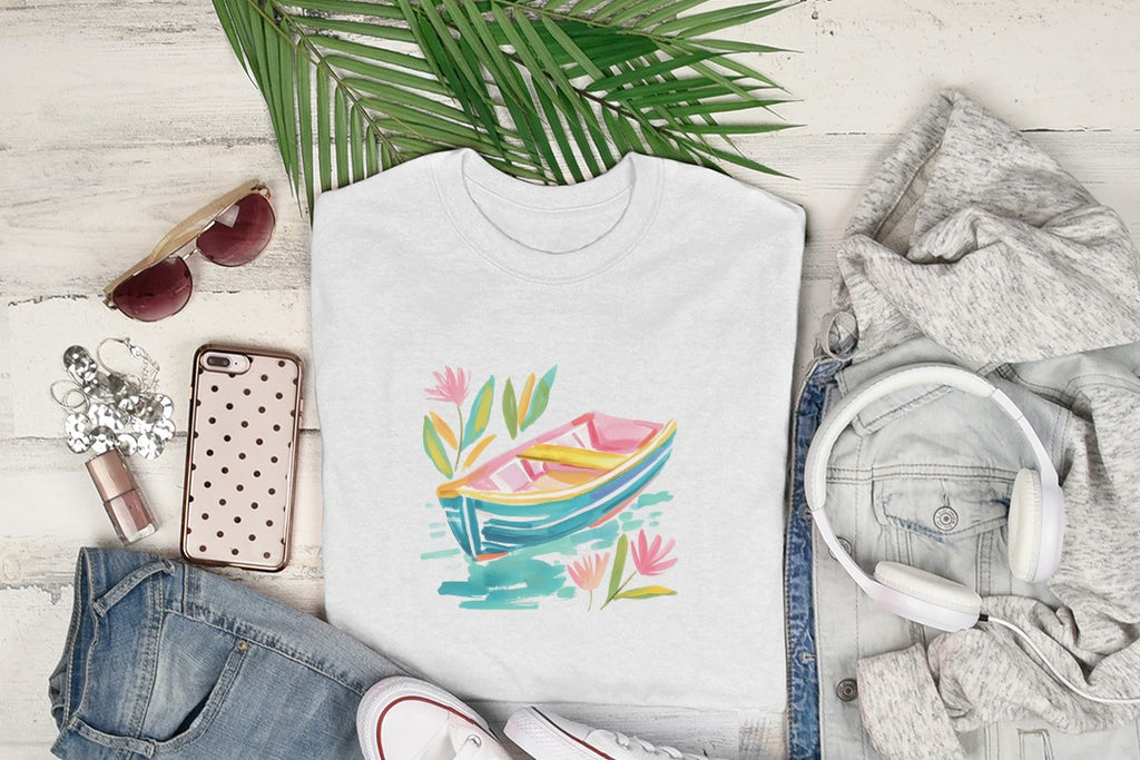 White t-shirt with colorful boat and floral graphic on aqua background.