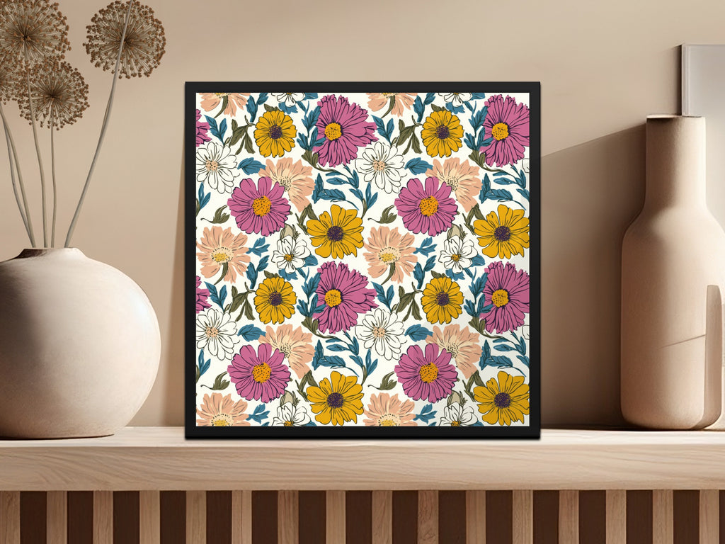 Framed floral art with pink, yellow, and white flowers on a cream background.