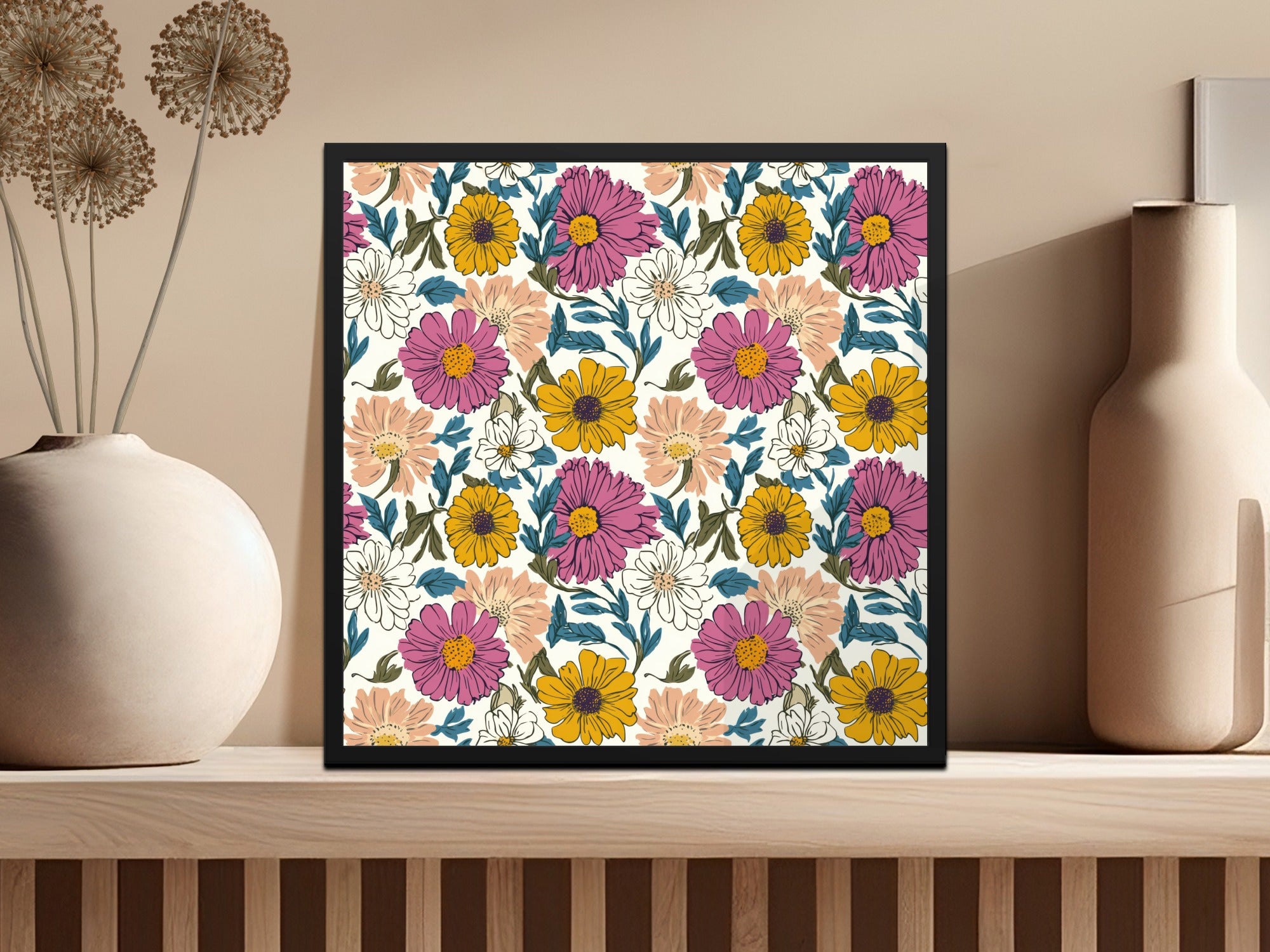 Framed floral art with pink, yellow, and white flowers on a cream background.