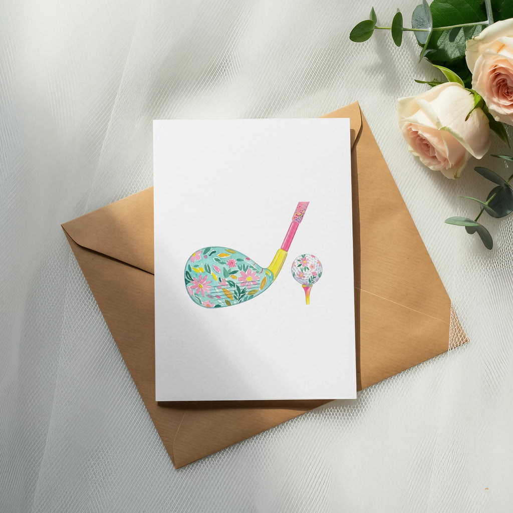 Floral golf club and ball on a greeting card with envelope and roses.