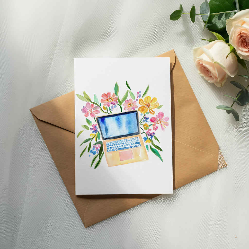 Watercolor illustration of a laptop surrounded by colorful flowers on an envelope.