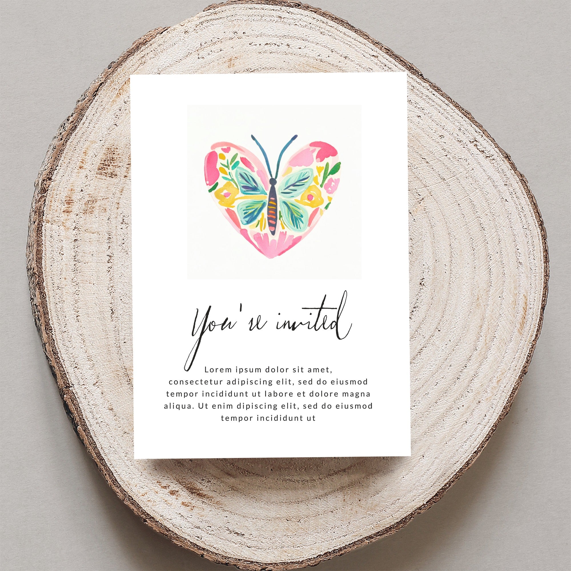 Invitation card with watercolor butterfly and text.
