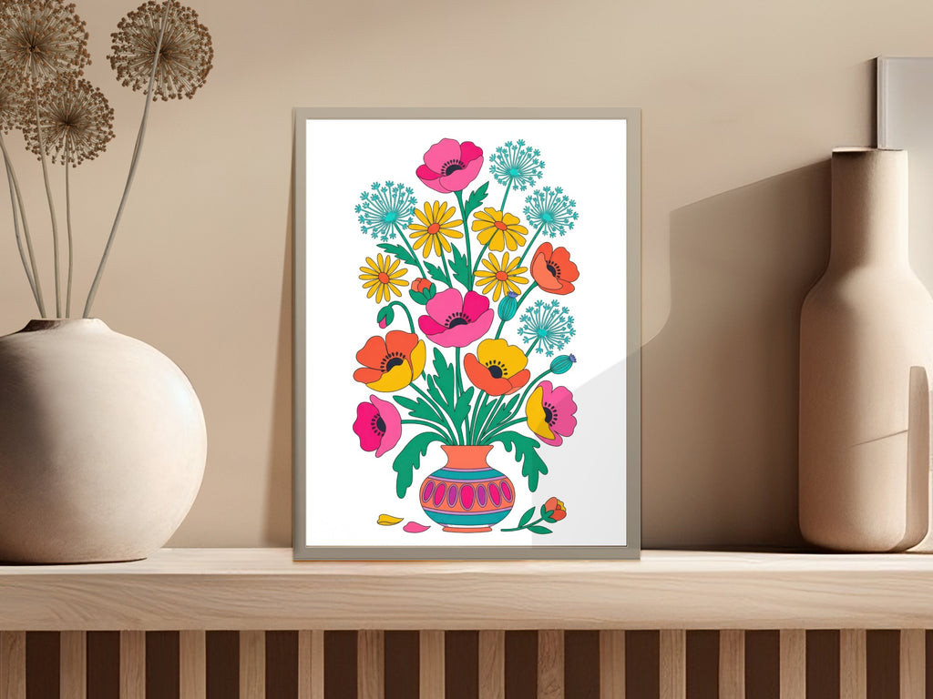 Colorful floral illustration in vase on shelf with two vases.