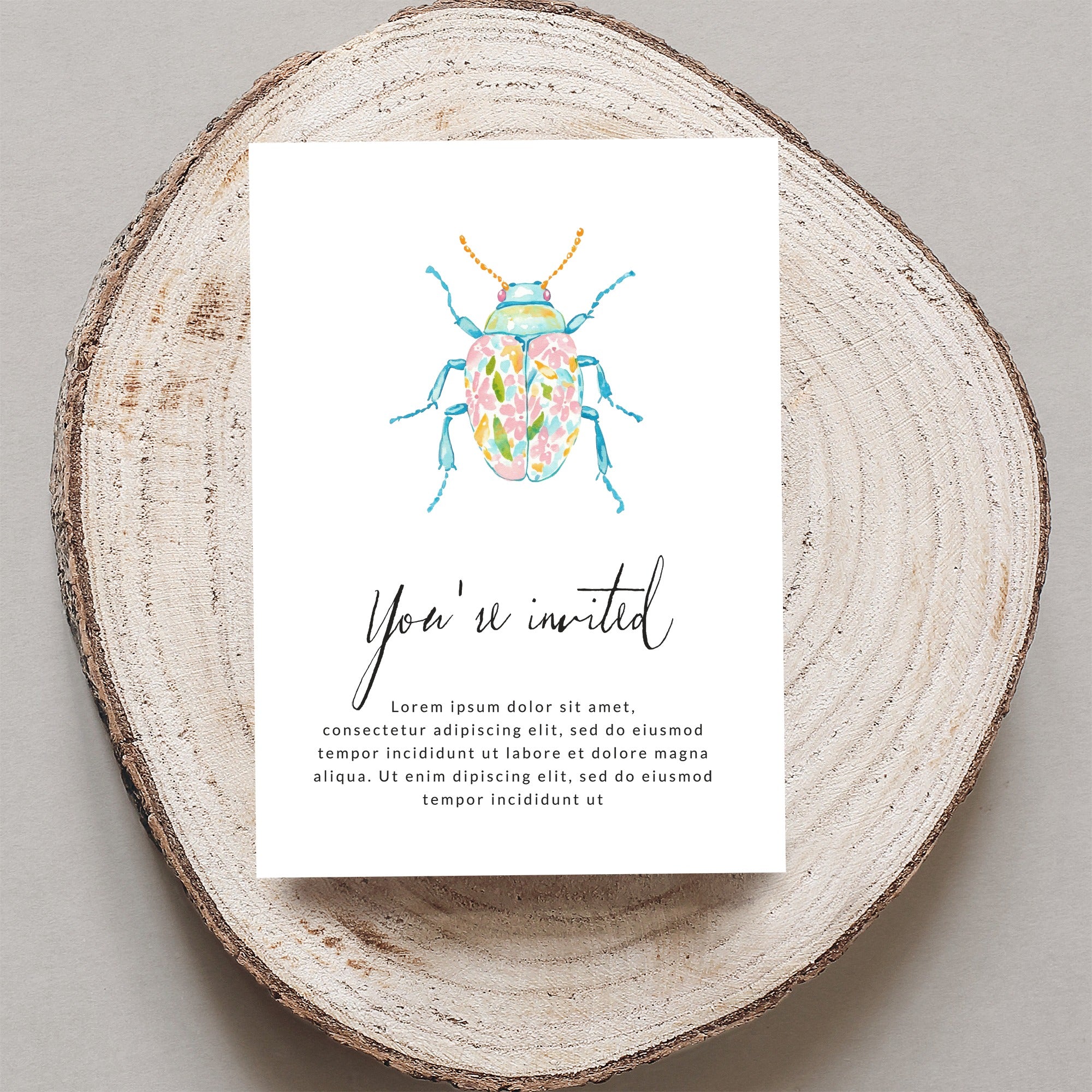 Invitation card with watercolor beetle and "You're invited" text.