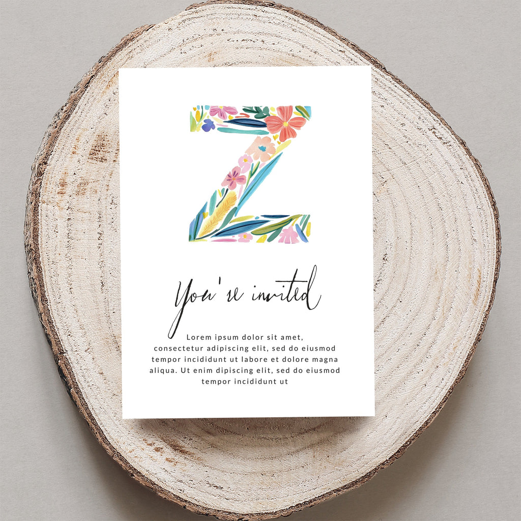 Invitation with watercolor flowers on letter Z, reading "You're invited" and placeholder text.