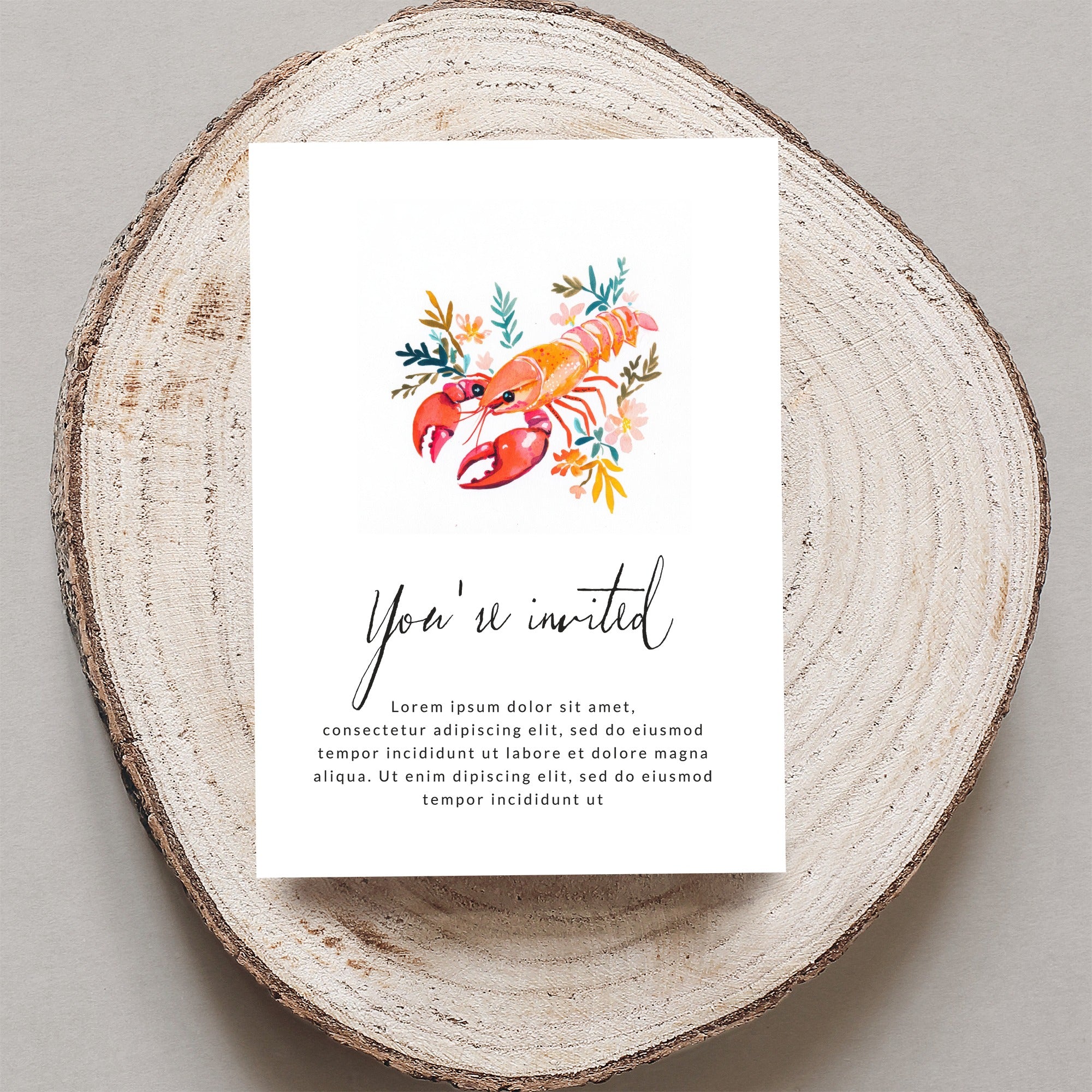 Invitation with a lobster illustration and floral accents, reading "You're invited."