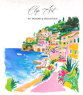 Colorful coastal village with buildings on a hillside overlooking the sea.