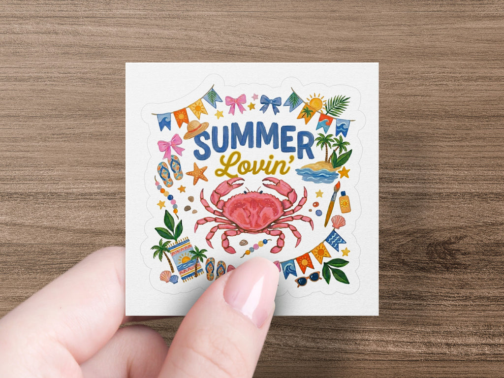 Crab with "Summer Lovin'" text and beach-themed icons on sticker.