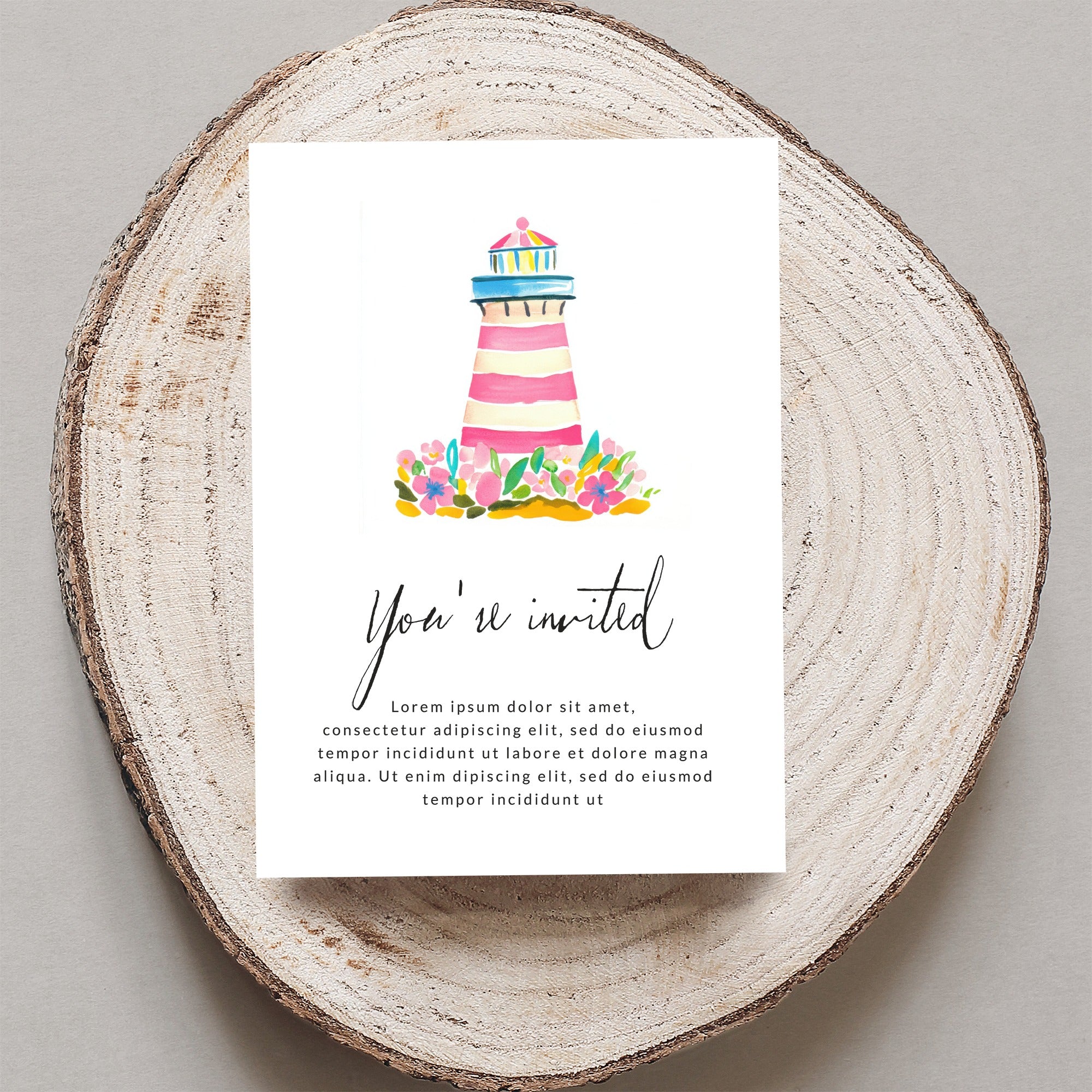 Watercolor lighthouse and flowers on invitation, "You're invited" text.