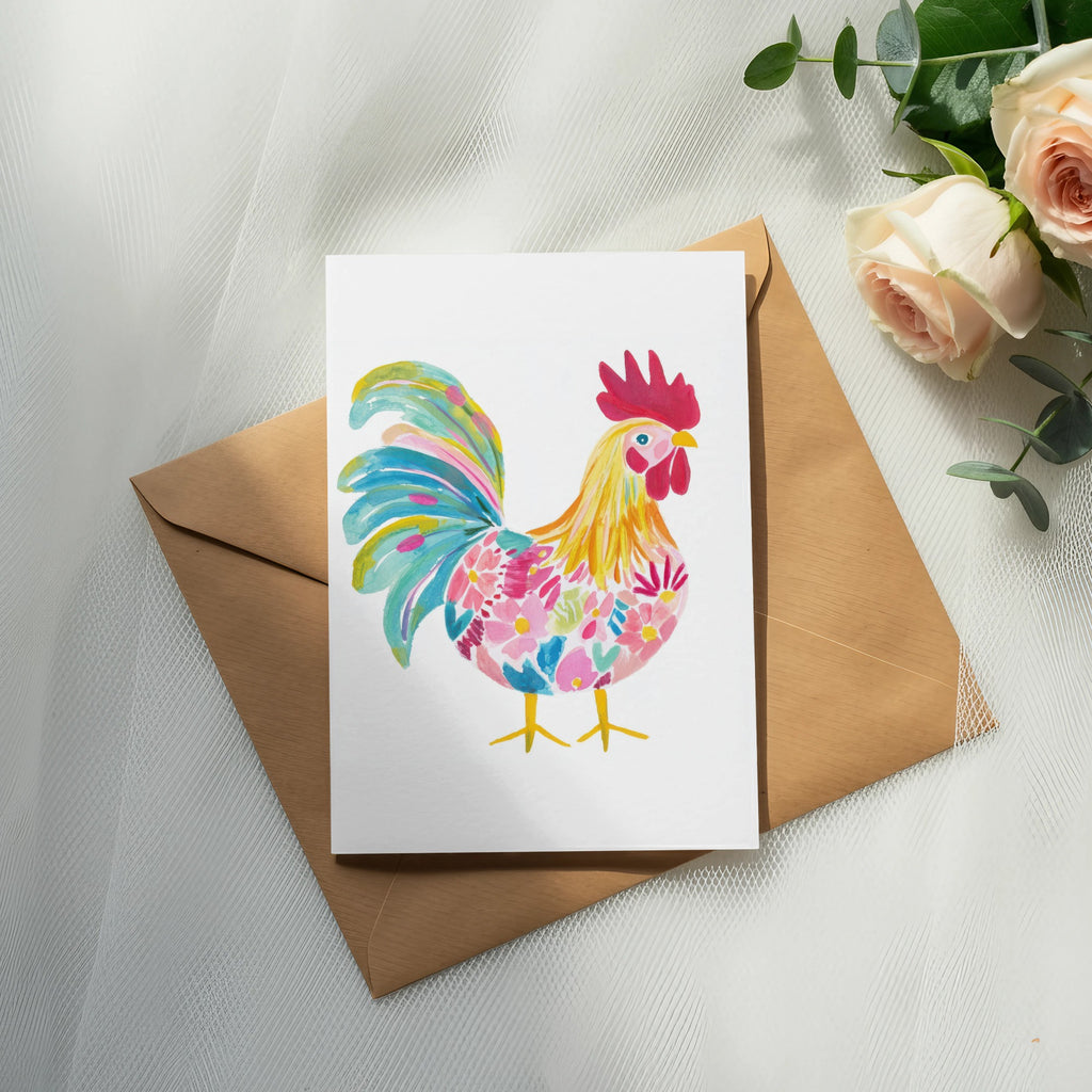 Watercolor rooster illustration on a card, with roses and eucalyptus.