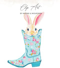 Easter bunny peeking out of a floral cowboy boot.