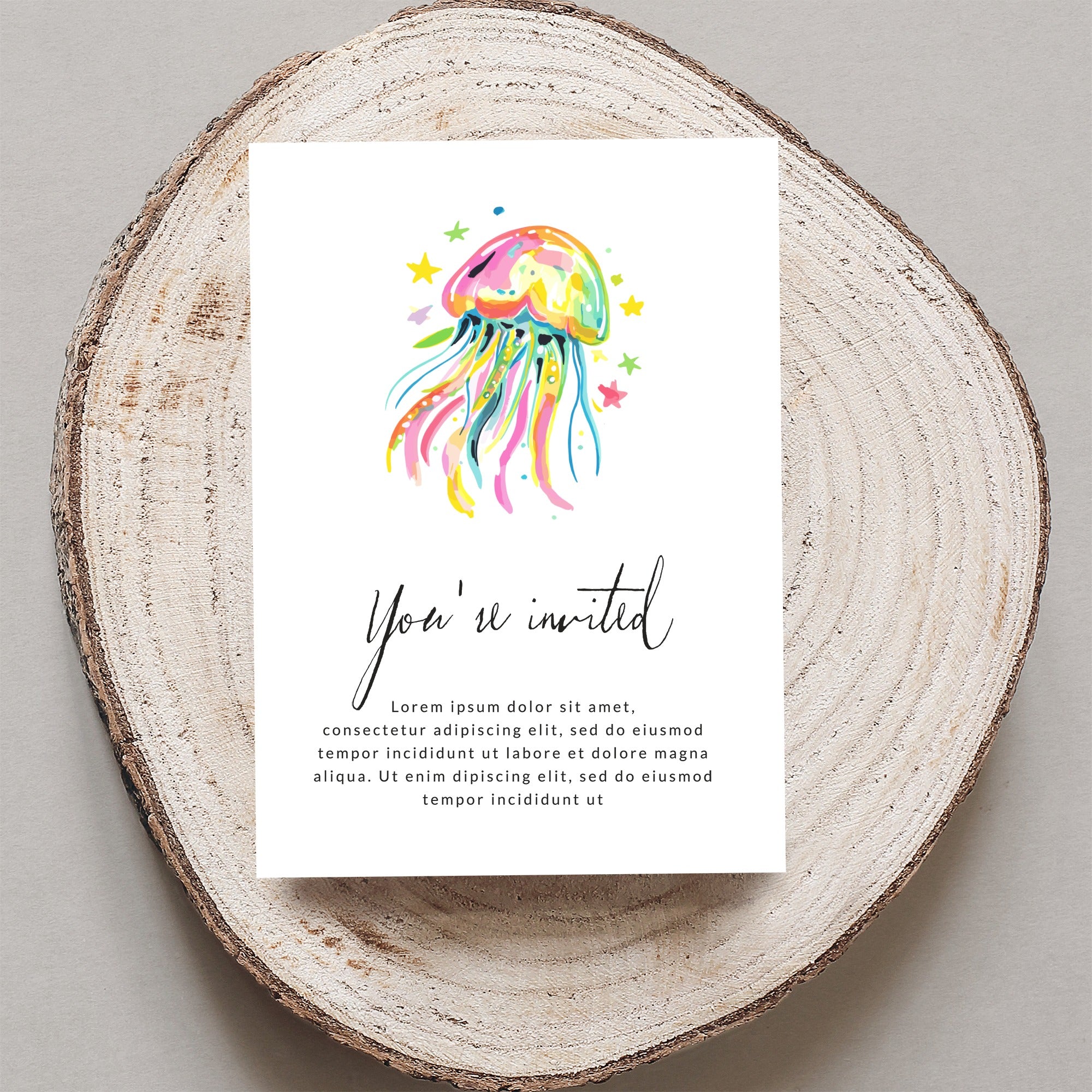 Invitation with colorful watercolor jellyfish and "You're invited" text.