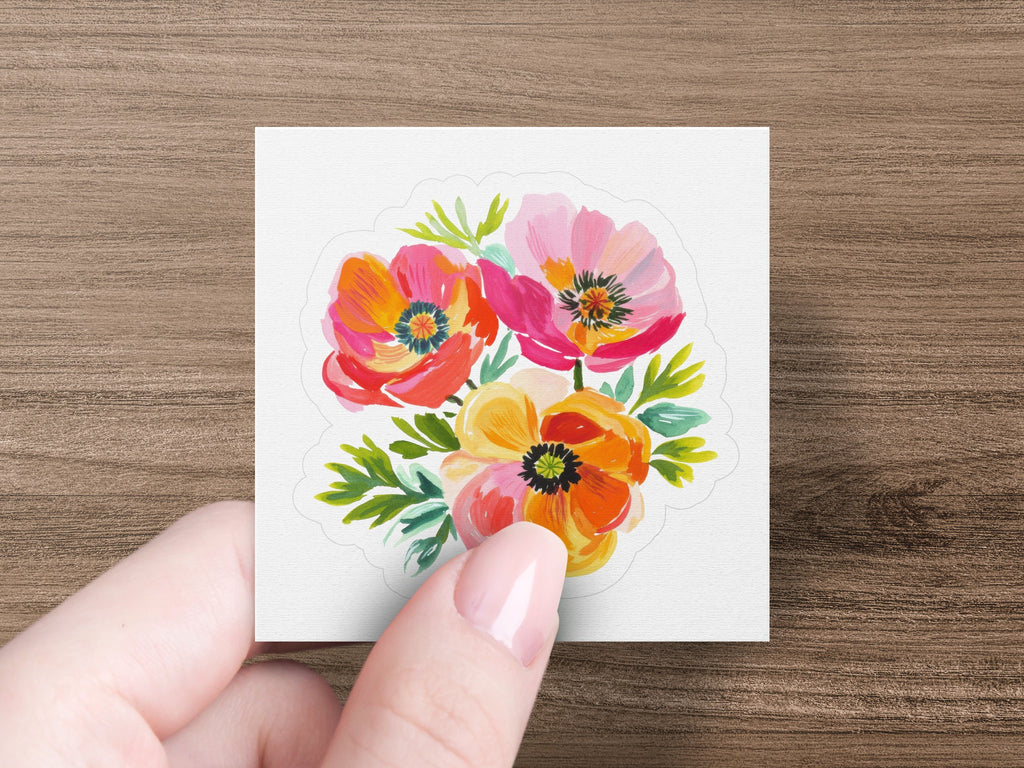 Floral sticker with three poppies in vibrant pinks and oranges.