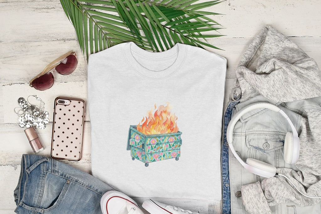 White t-shirt with a graphic of a burning dumpster with flowers.