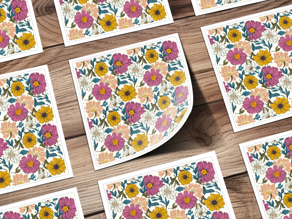 Floral pattern stickers on a wooden background, arranged in a grid.