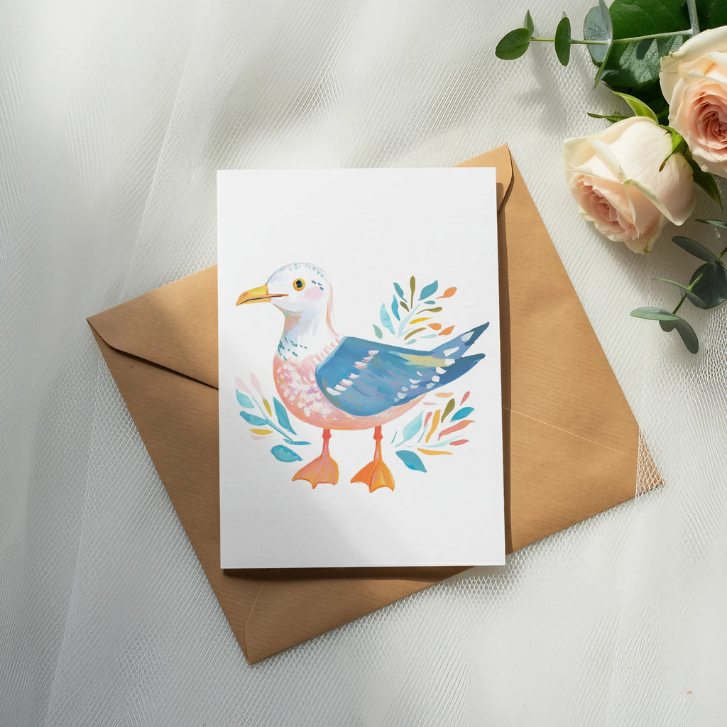 Watercolor illustration of a seagull on a card with a kraft envelope and roses.