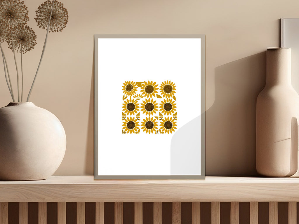 Framed artwork of a nine-square grid with yellow sunflowers.