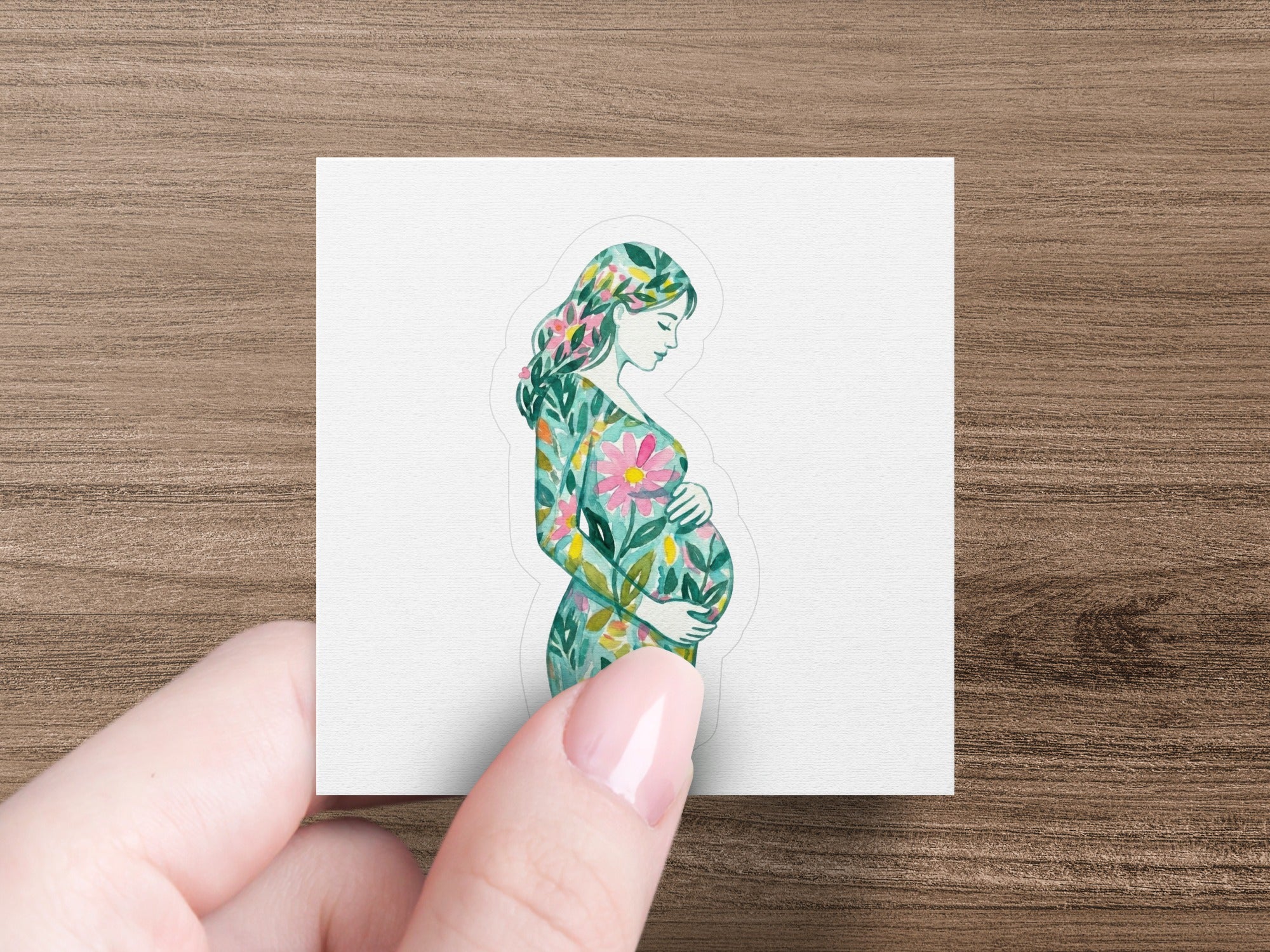 Illustration of a pregnant woman with floral patterns on her body.