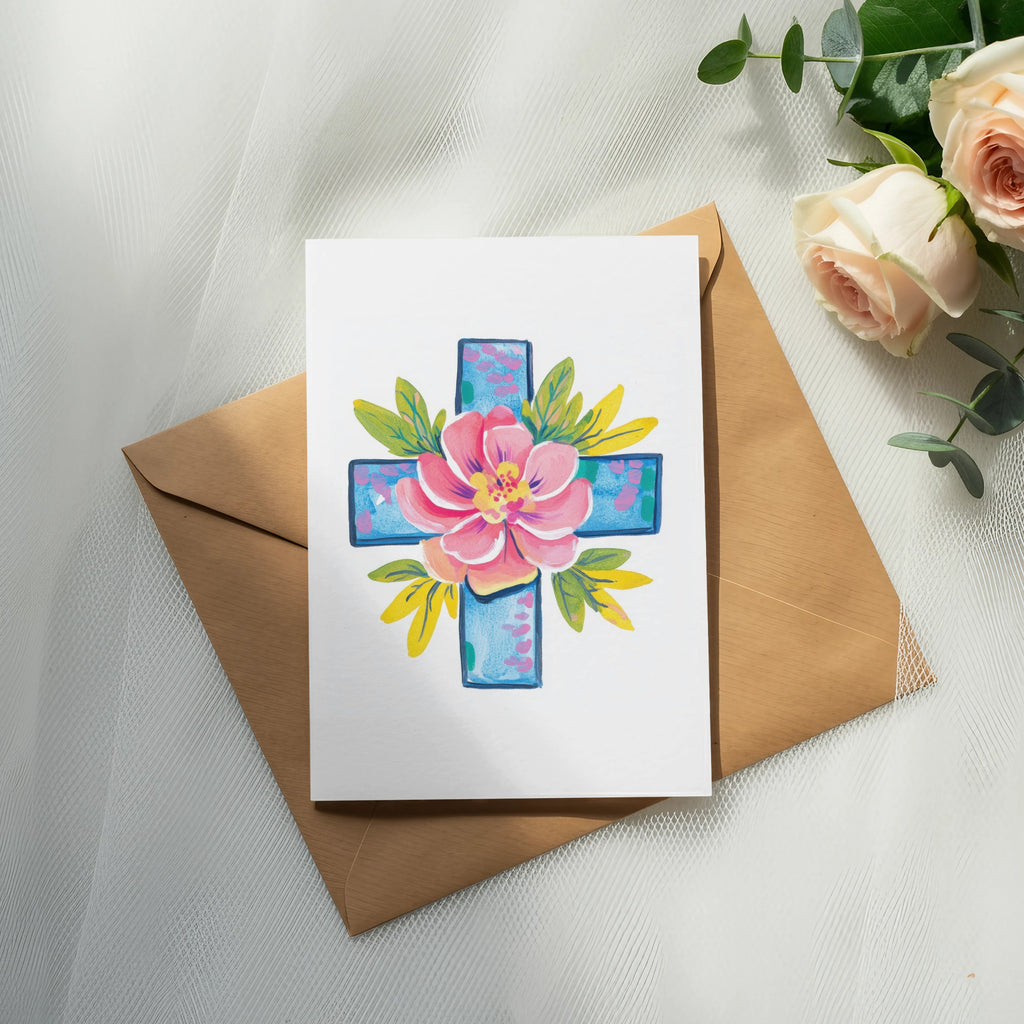 Watercolor cross with pink flower and green leaves on card, on envelope.