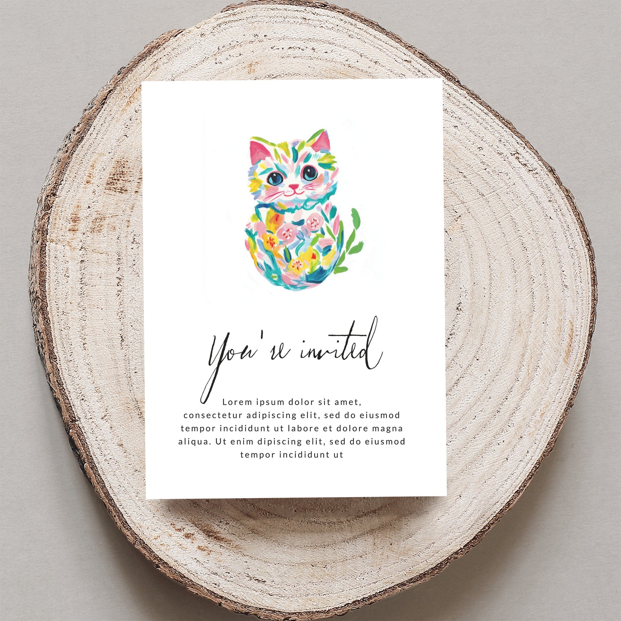 Invitation card with colorful watercolor cat illustration and "You're invited" text.
